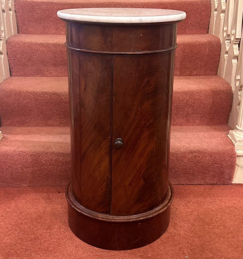 Regency period flame-mahogany cylindrical bedside Cupboard 