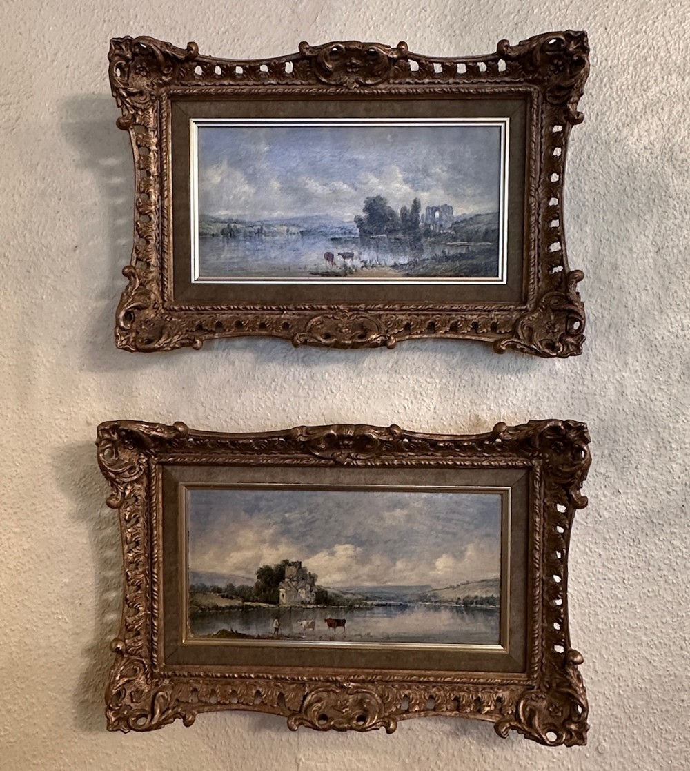A PAIR of 19th century framed oil paintings on canvas - Riverscapes