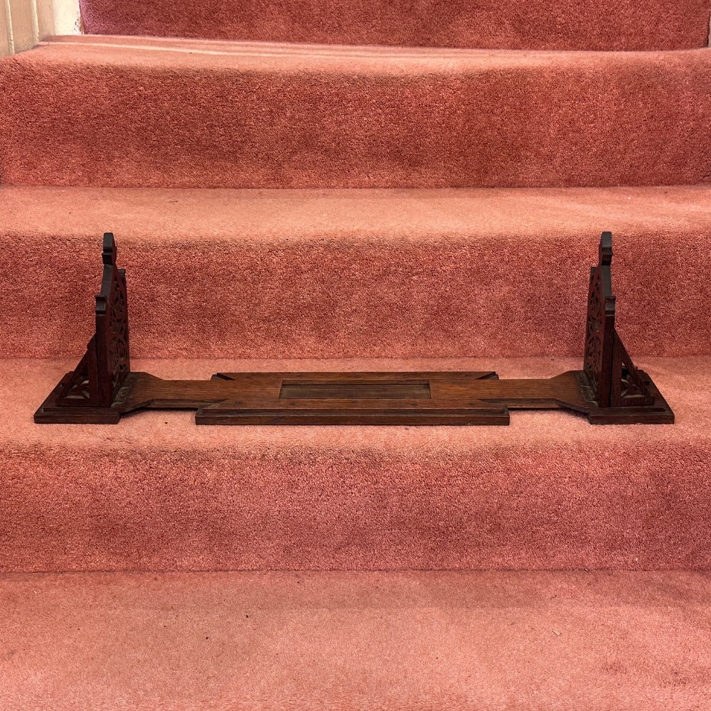 A Victorian Gothic Oak extending table-top Bookslide