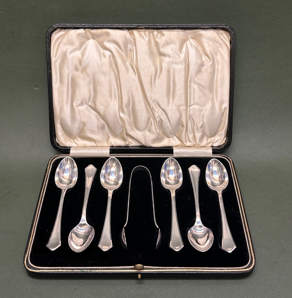 Boxed set of SIX hallmarked silver Teaspoons and Sugar Tongs. 