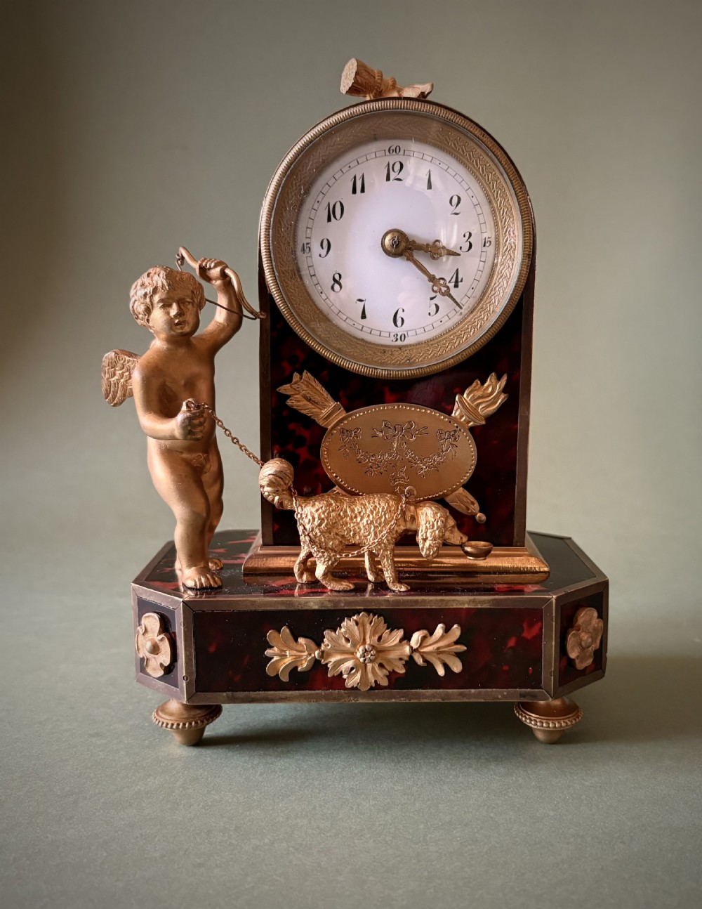 A CHARMING FRENCH SMALL MANTEL CLOCK