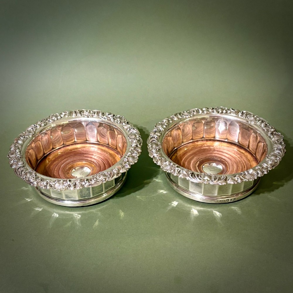 FINE PAIR OF HALLMARKED SILVER WINE COASTERS