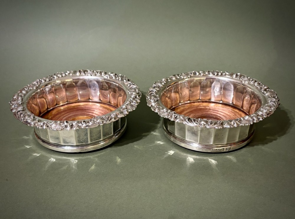FINE PAIR OF HALLMARKED SILVER WINE COASTERS View II