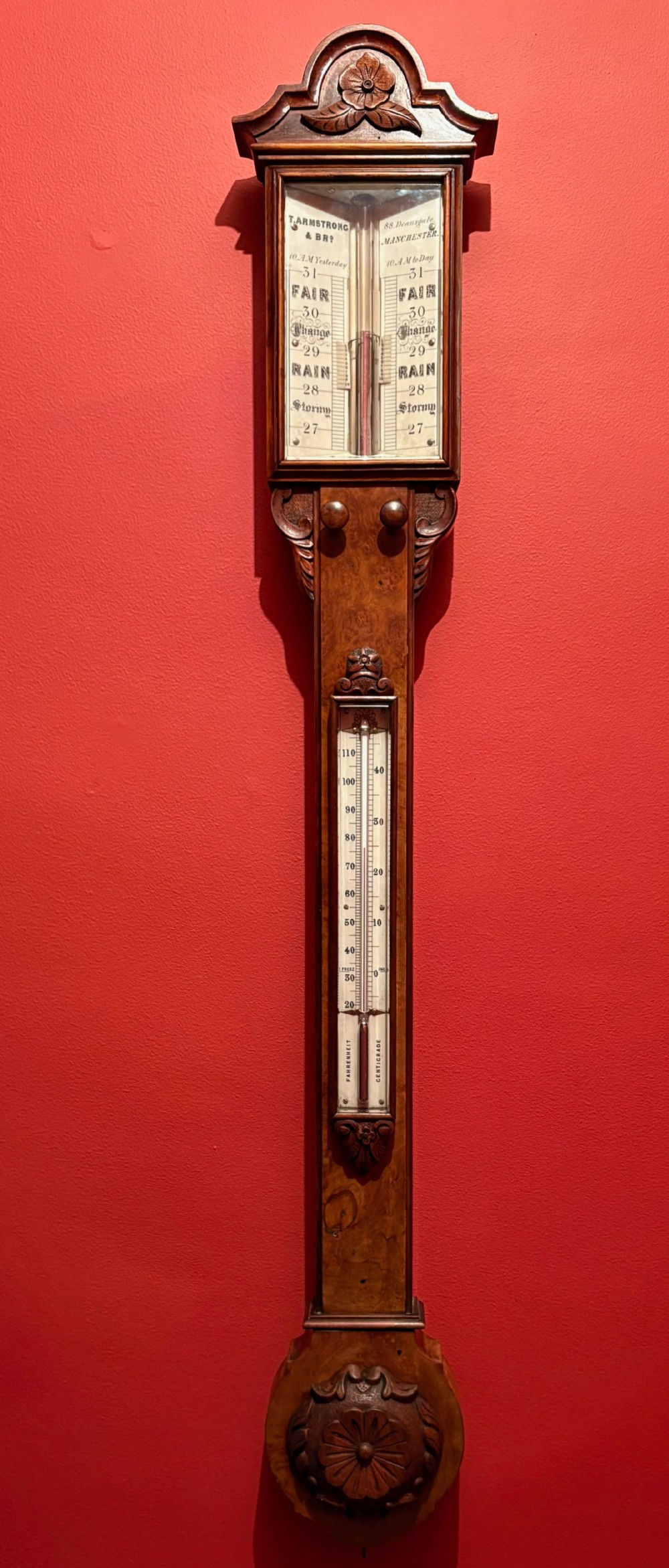 A VERY FINE WALNUT STICK BAROMETER