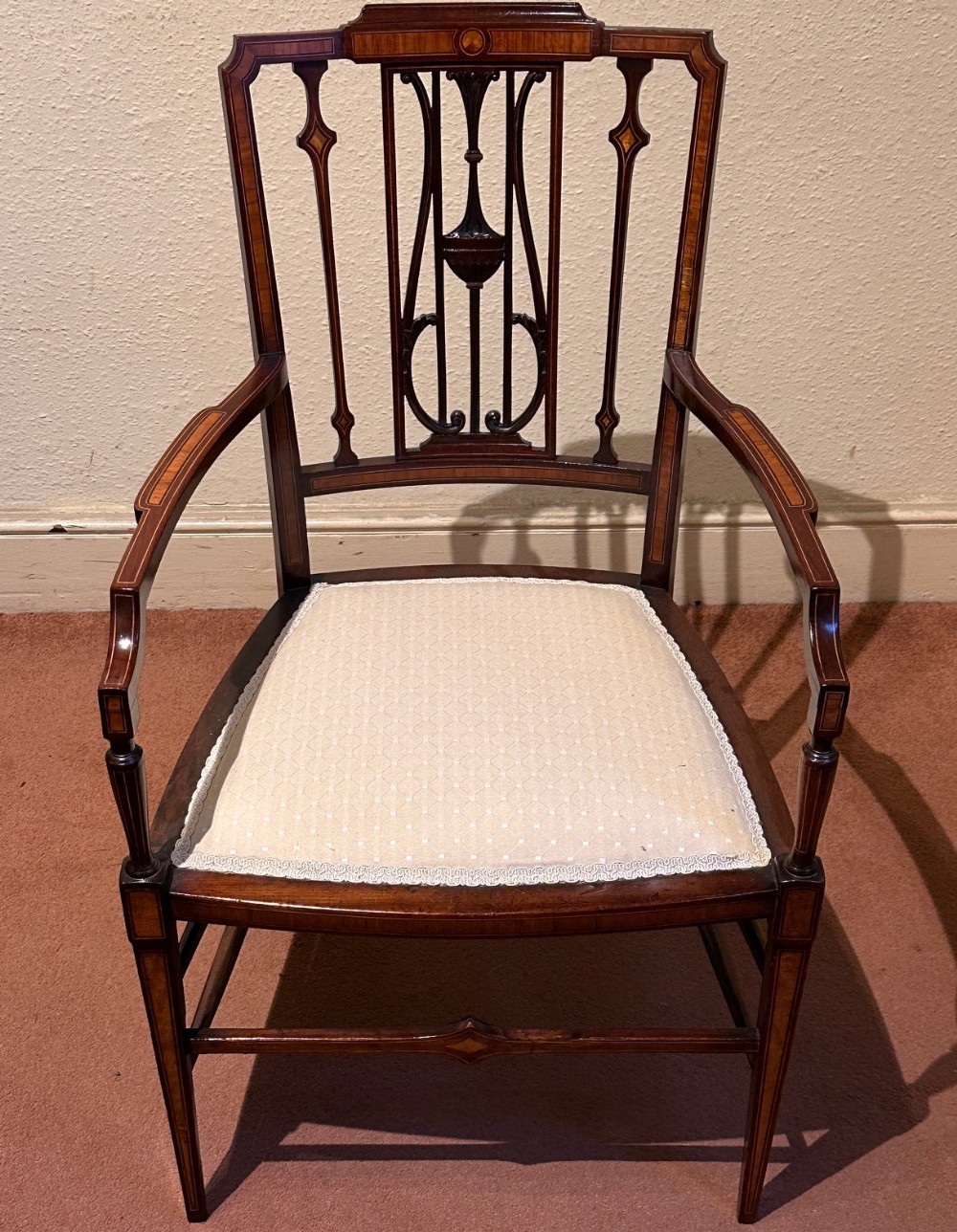 A charming Edwardian mahogany Bedroom armchair
