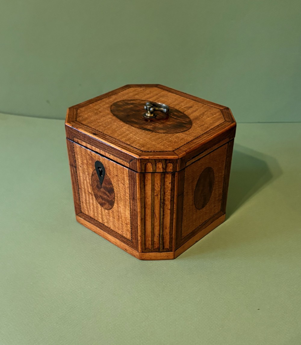 A FINE GEORGE III INLAID TEA CADDY View II