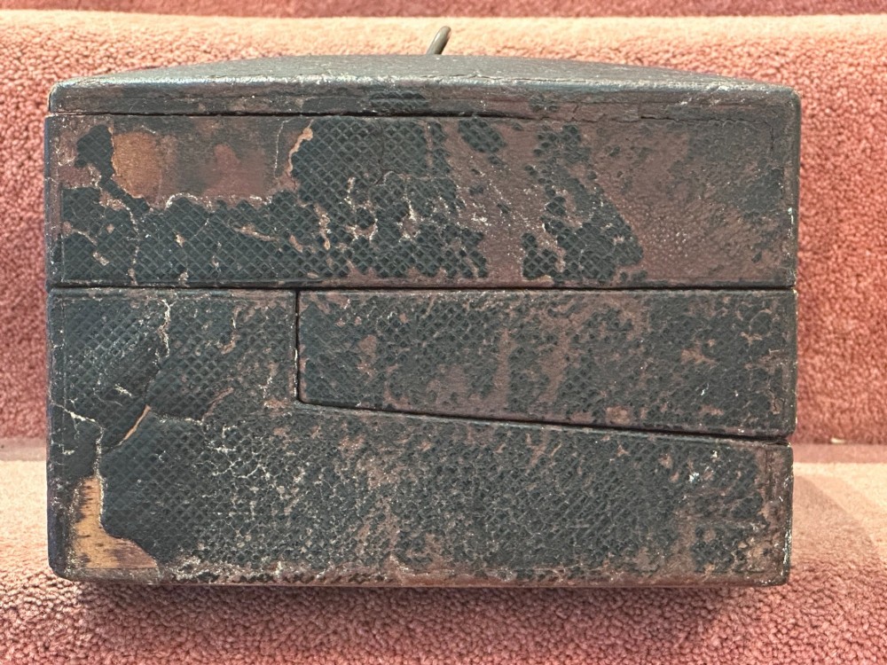 An open Victorian leather-bound writing box featuring internal letter slots, a pen tray, an inkwell compartment, and brass hardware. View XIII