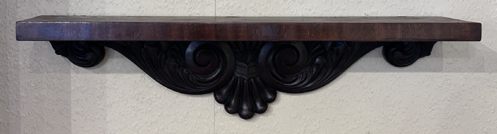 PAIR of Georgian carved mahogany hanging wall shelves View II