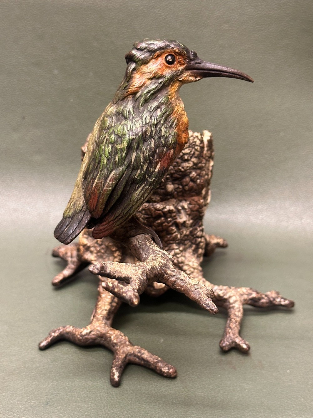 A cold painted bronze inkwell depicting a kingfisher bird perched on a branch above a tree stump base. View IV
