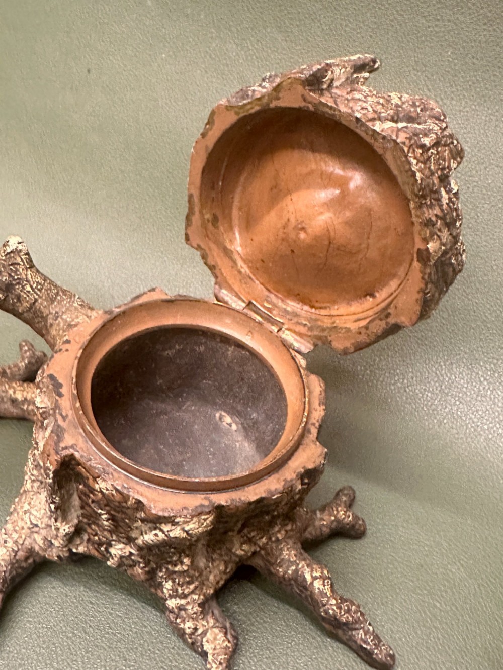 A cold painted bronze inkwell depicting a kingfisher bird perched on a branch above a tree stump base. View VII