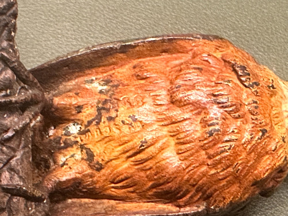 A cold painted bronze inkwell depicting a kingfisher bird perched on a branch above a tree stump base. View IX