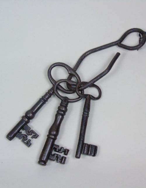 Massive Antique Iron Keys on Beaten Iron Hook