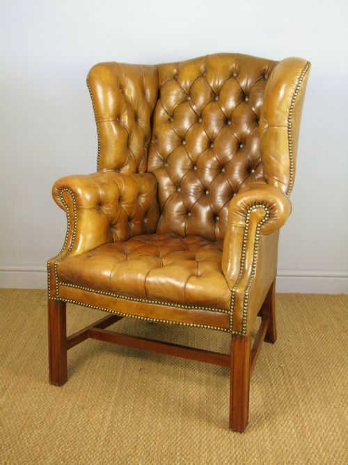 Superb Antique Buttoned Leather Wing Armchair