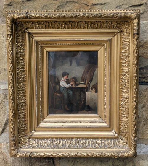 fig 1. A pair of 19th-century oil paintings depicting young boys in rustic attire, mounted within deep, ornate gilded wooden frames.