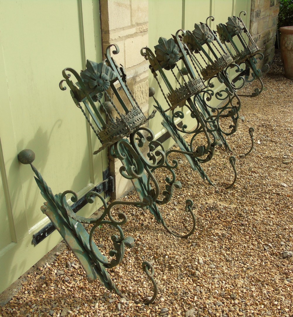Antique Spanish Style Wrought Iron Wall Scones Set of Four