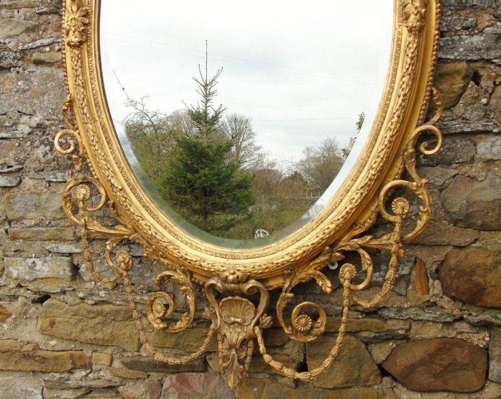 Outstanding Pair of Large Antique Gilt and Gesso Oval Mirrors in the Adam Style View IV