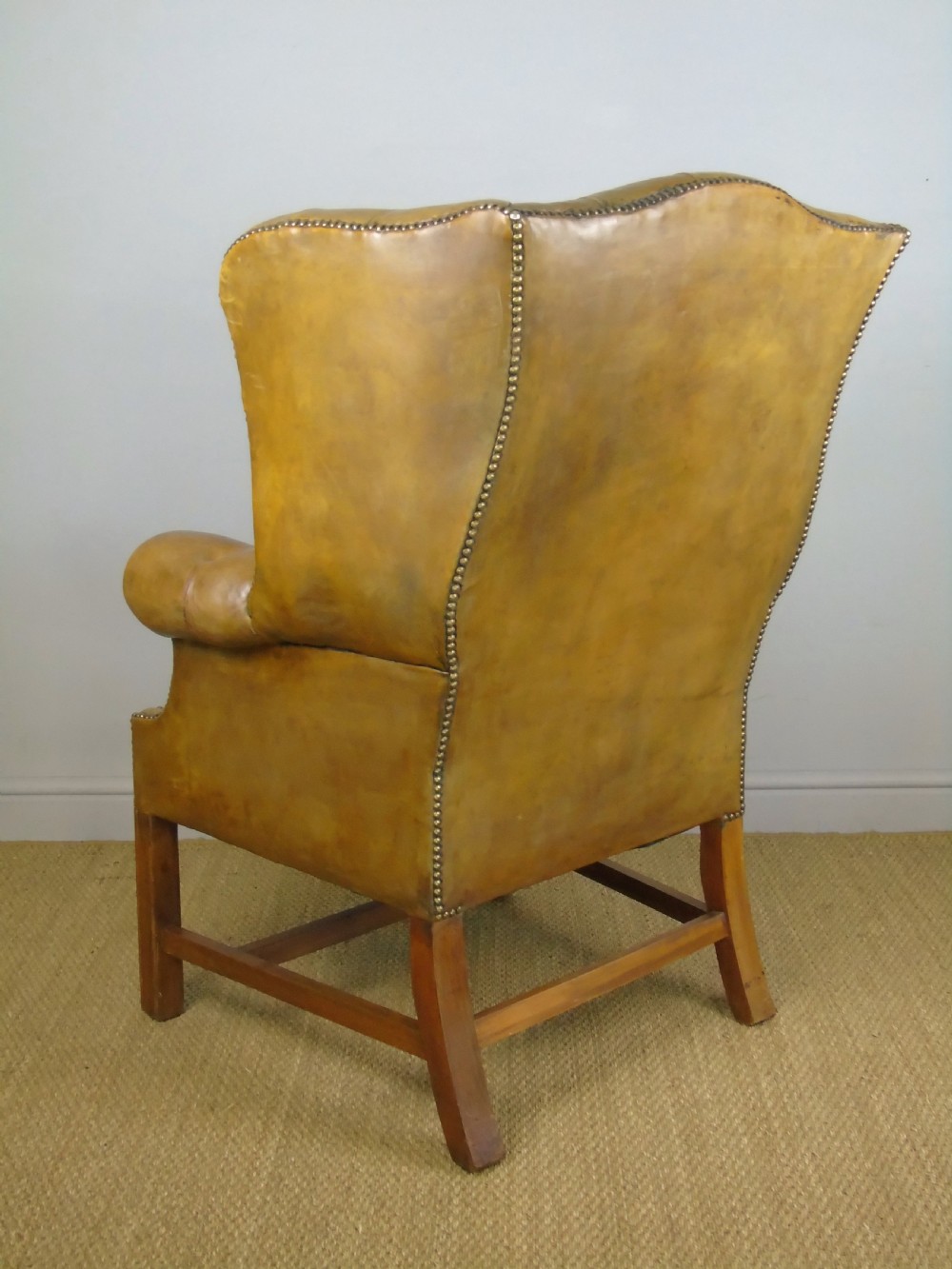 Superb Antique Buttoned Leather Wing Armchair View X