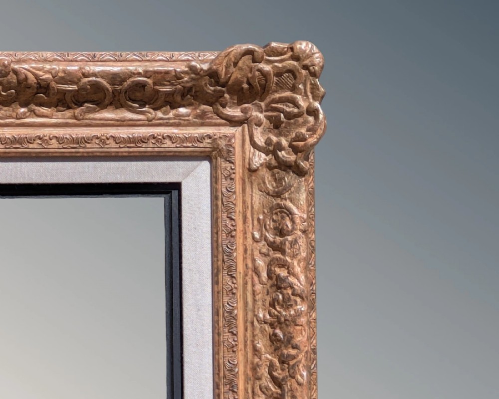 A large rectangular Montparnasse picture frame featuring ornate carved shell and scroll motifs with a cream linen inner slip. View III