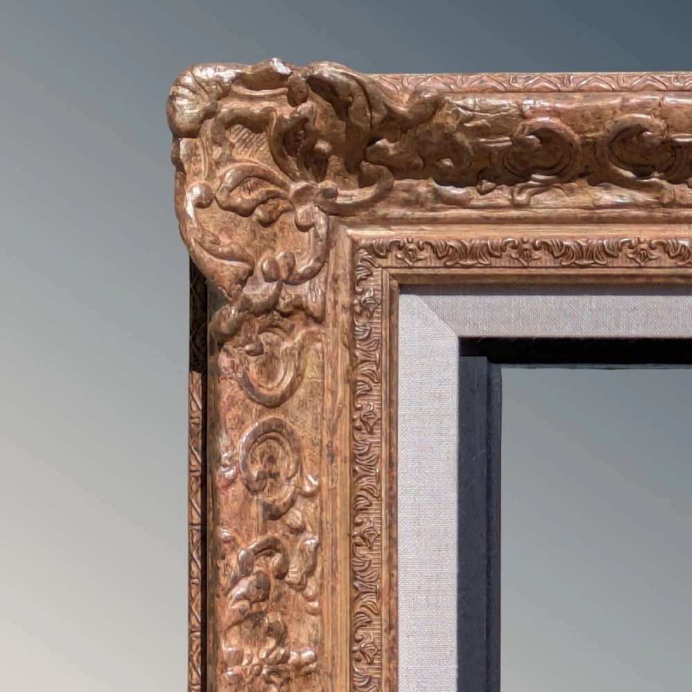 A large rectangular Montparnasse picture frame featuring ornate carved shell and scroll motifs with a cream linen inner slip. View IV