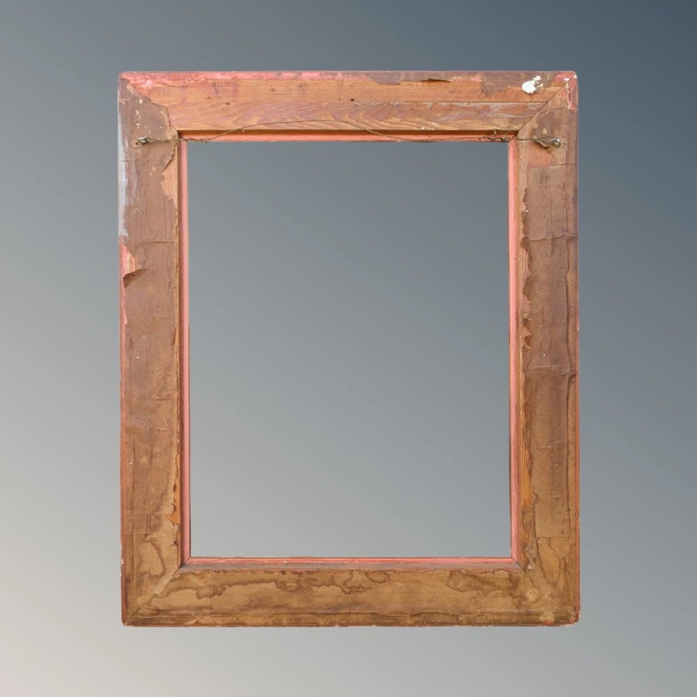 A rectangular antique gilt picture frame featuring a reeded outer border, a deep cove profile, and beaded inner moulding. View V