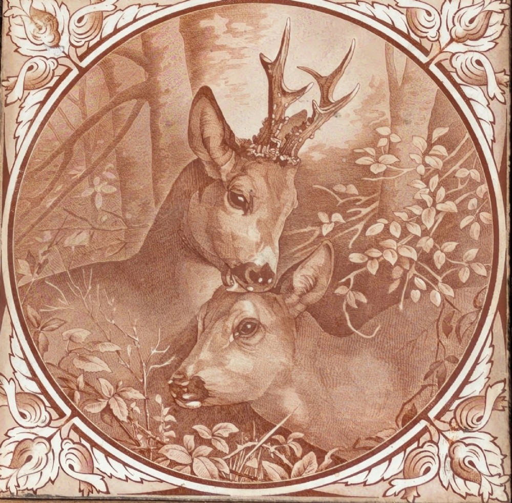 A square antique ceramic tile depicting a stag and doe in a woodland setting, framed within carved oak rope-twist moulding. View II