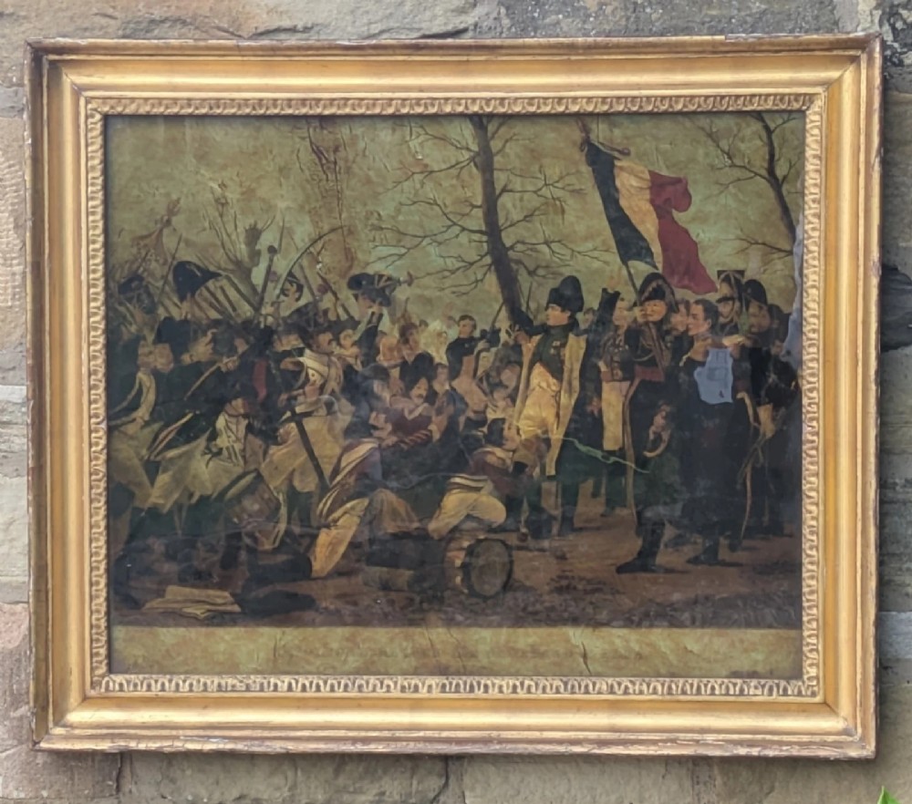 A 19th-century framed crystoleum glass print depicting Napoleon Bonaparte amongst soldiers returning from Elba, set inside a moulded gold gilt frame.