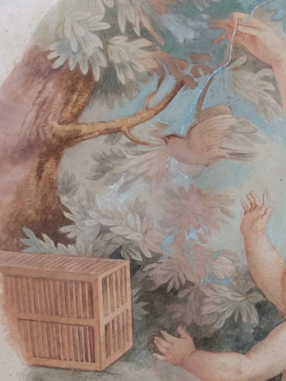 A framed classical watercolour painting depicting two draped female figures and a child beneath trees, presented in a moulded gilt frame. View VI