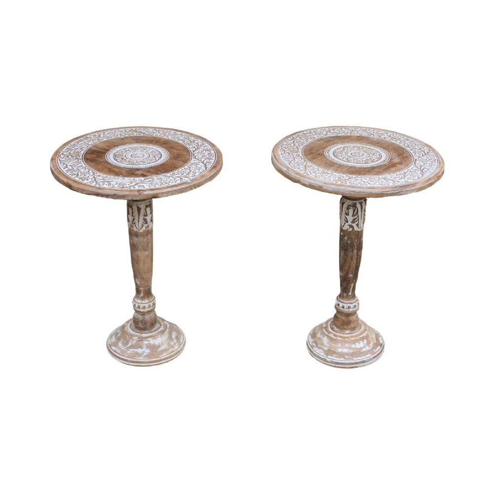 A pair of round carved wooden pedestal side tables featuring hand-painted whitewashed concentric floral patterns on the tops and turned bases. View VI
