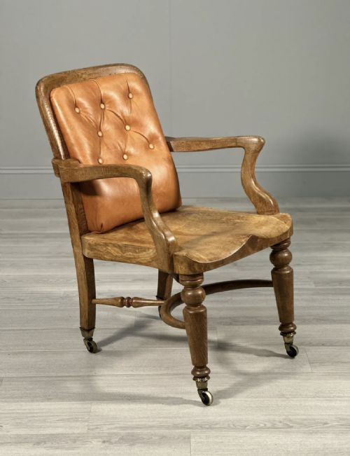 ANTIQUE OAK AND LEATHER DESK CHAIR