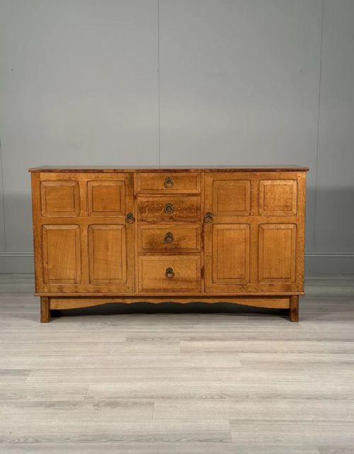 A 1930S OAK SIDEBOARD BY REYNOLDS OF LUDLOW FOR HEALS OF LONDON - ADDITIONAL PHOTO 1