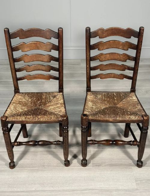 A PAIR OF ANTIQUE ELM RUSH LADDERBACK CHAIRS - ADDITIONAL PHOTO 5