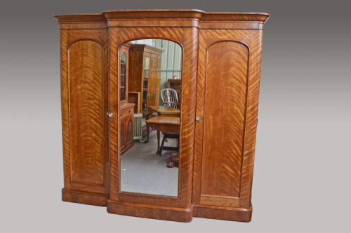 fig 1. Antique Victorian satin Birch breakfront triple wardrobe