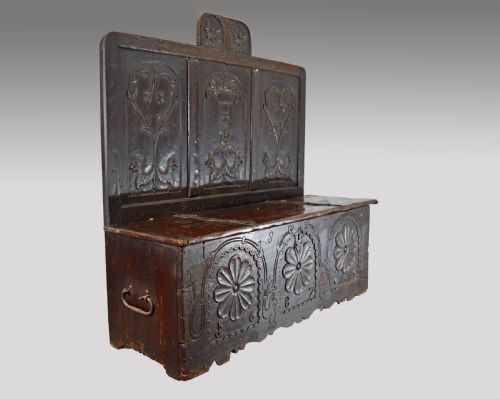 fig 1. 17th century carved oak marriage box settle