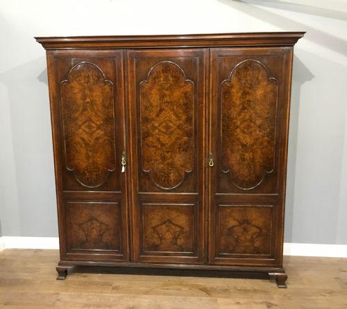 fig 1. Antique walnut triple wardrobe Waring and Gillows