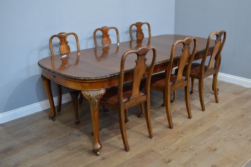 Antique Walnut Two Leaf Wind Out Dining Table and 6 Chairs by Merryweather of Holloway London