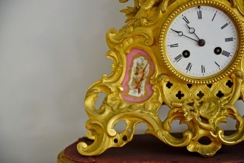 fig 1. Antique French gilt bronze and Sevres porcelain mantle clock