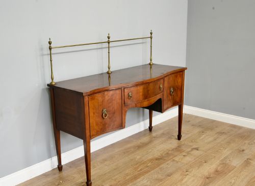 fig 1. Georgian mahogany serpentine sideboard