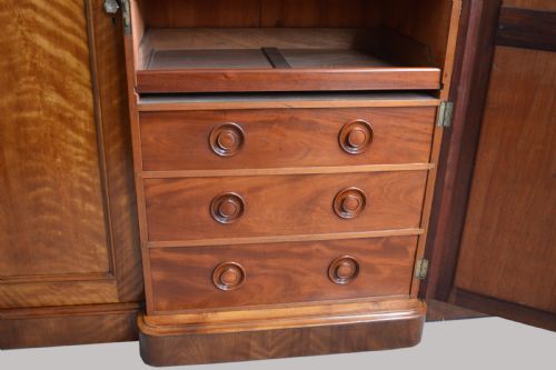 fig 1. Victorian satinwood breakfront triple compactum wardrobe