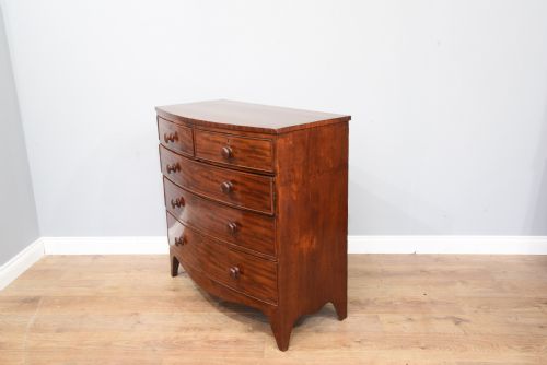 fig 1. Antique Georgian mahogany bow front chest of drawers