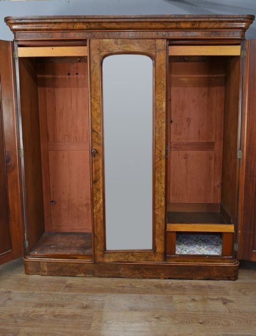 fig 1. Victorian walnut triple wardrobe