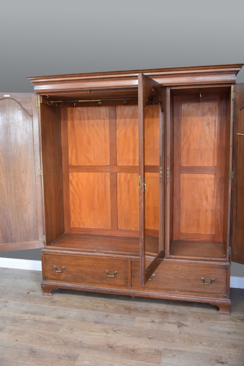 fig 1. Antique walnut triple wardrobe by harrods London