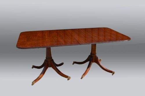 fig 1. Antique Regency style extending twin pillar dining table