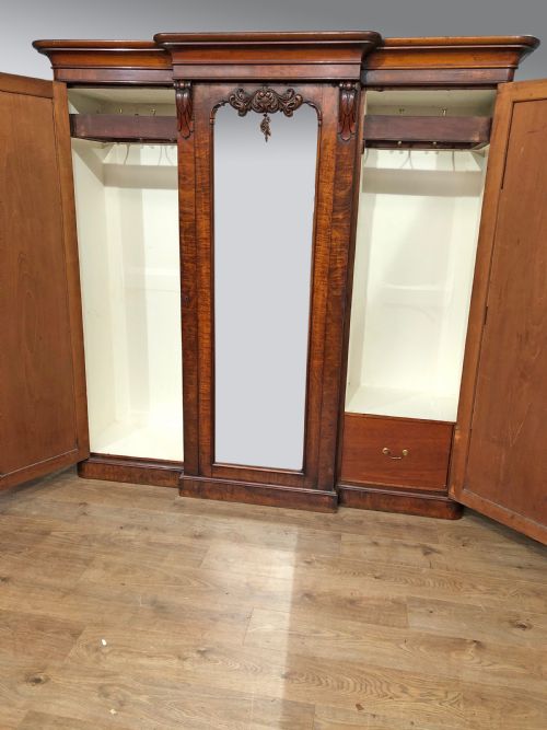 fig 1. Victorian walnut breakfront triple wardrobe