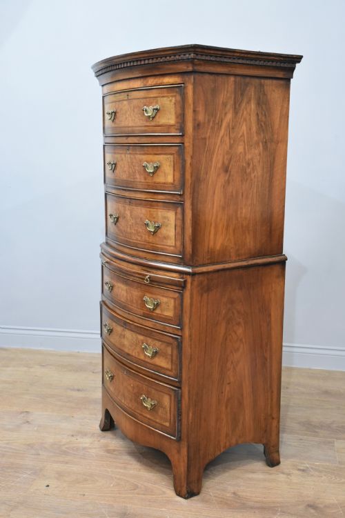 fig 1. Walnut bow front chest on chest