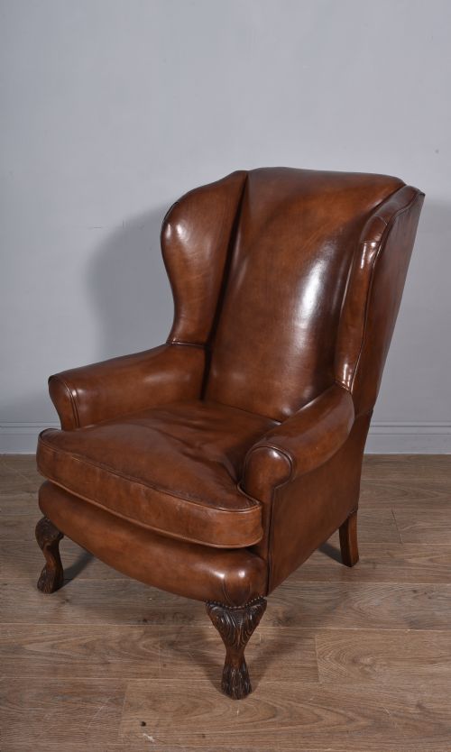 fig 1. fine antique leather wing chair