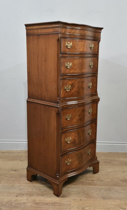 fig 1. Antique Regency style mahogany serpentine tall boy chest on chest