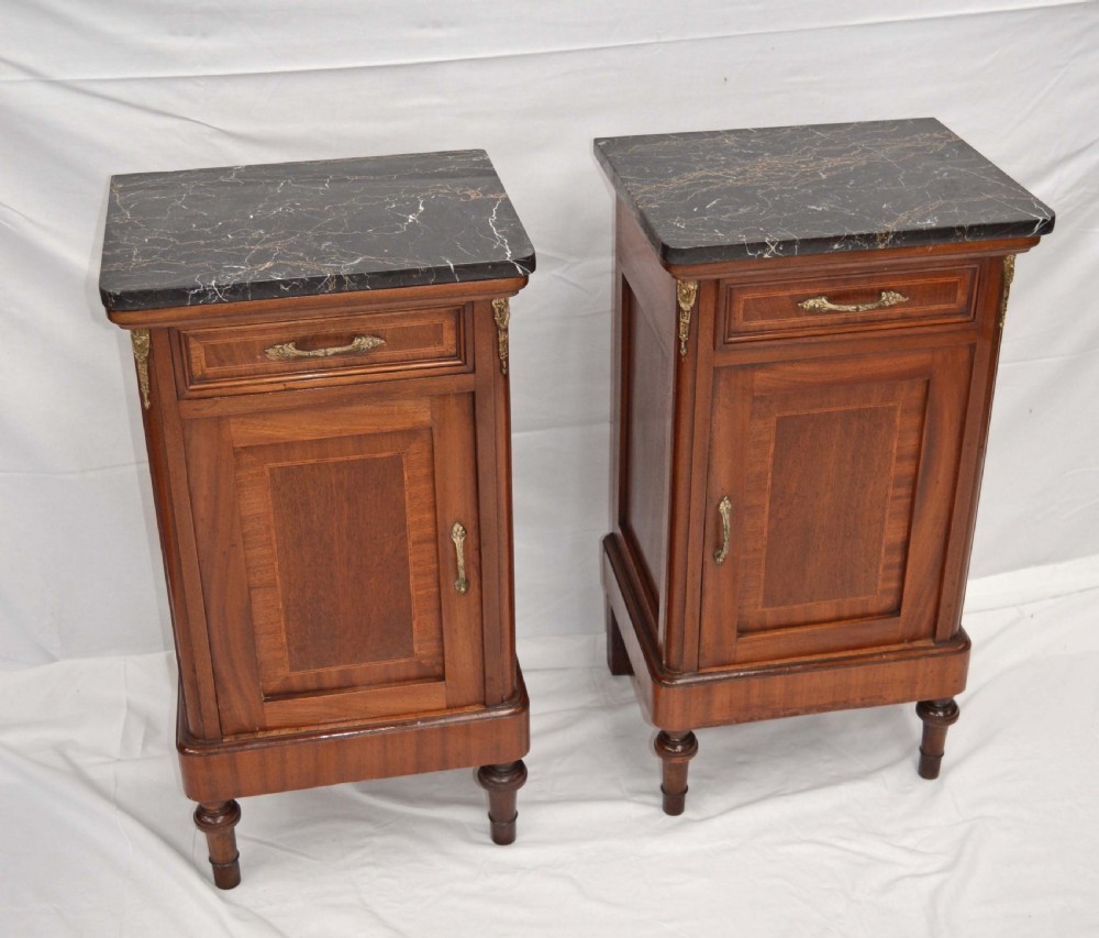 antique pair of French mahogany marble top bedside cabinets