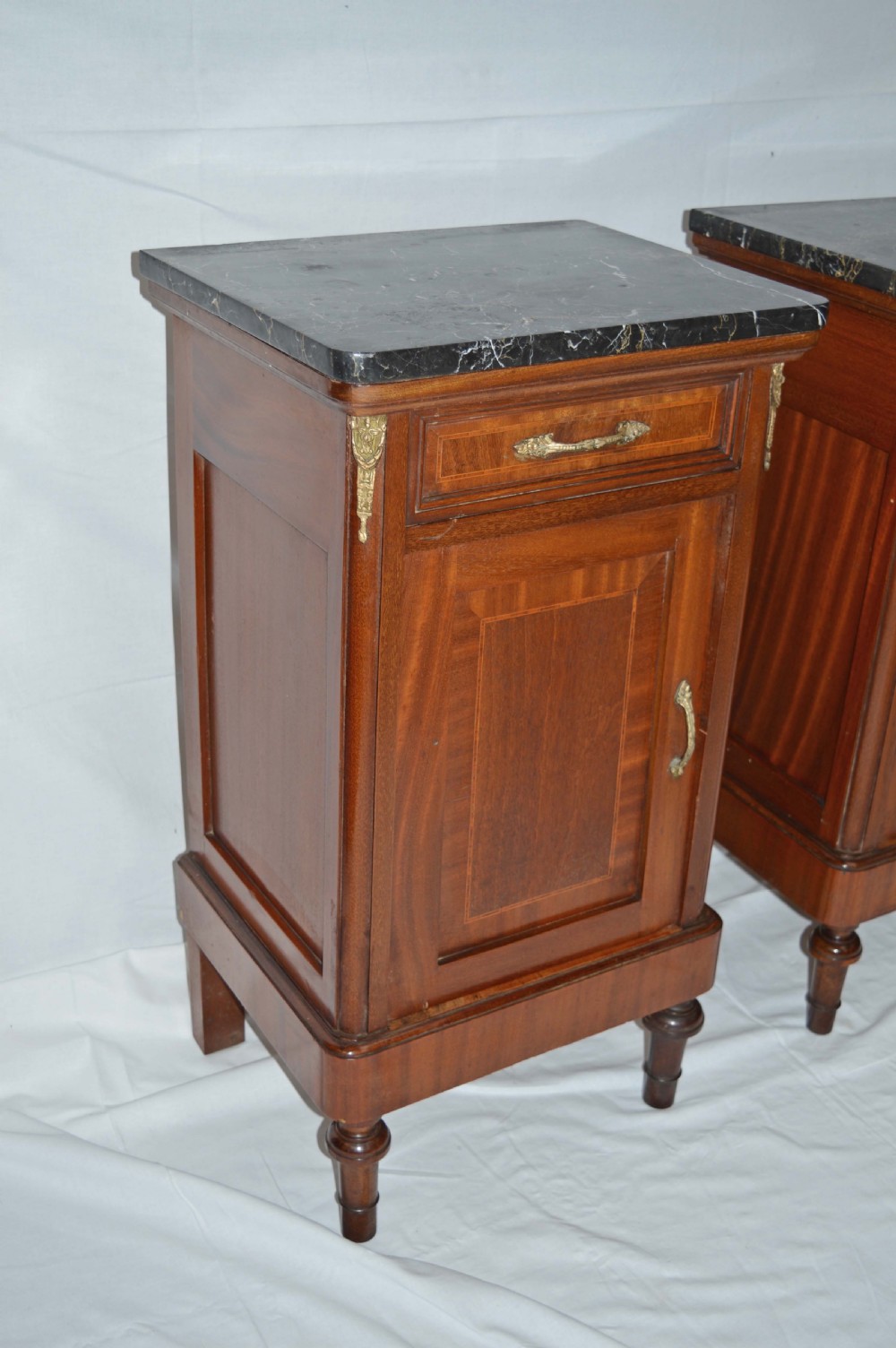 antique pair of French mahogany marble top bedside cabinets View II