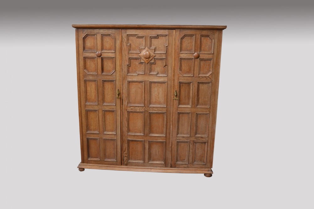 antique oak Jacobean style triple wardrobe 