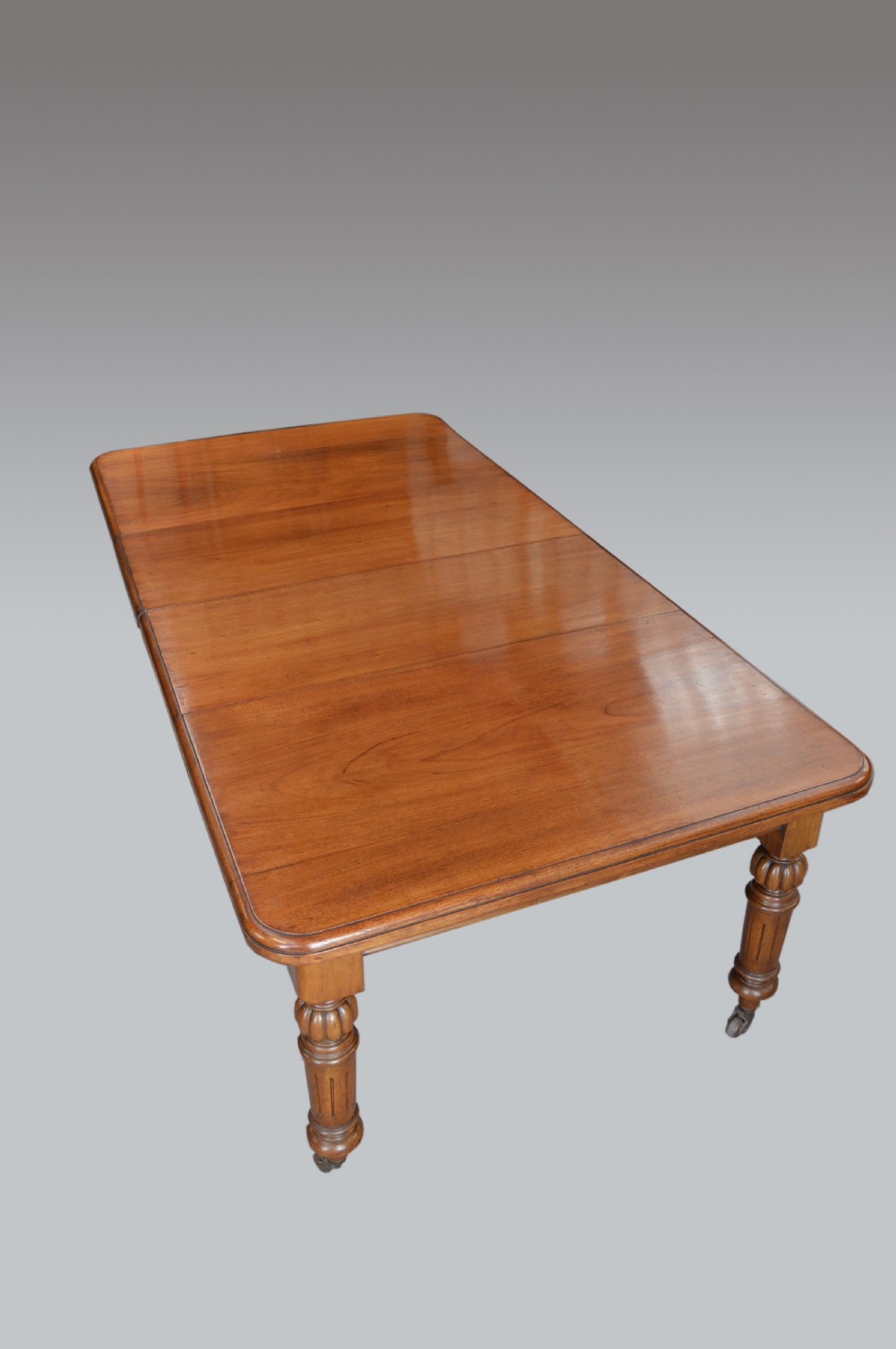 Antique Victorian two leaf extending dining table seats 10  View II